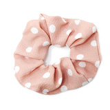 Satiny polka dot soft fabric scrunchie